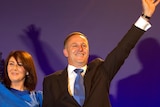 New Zealand prime minister John Key and his wife Bronagh Key (L) wave as they celebrate his election victory