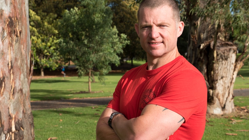 Fitness instructor Rob Coad in a park.