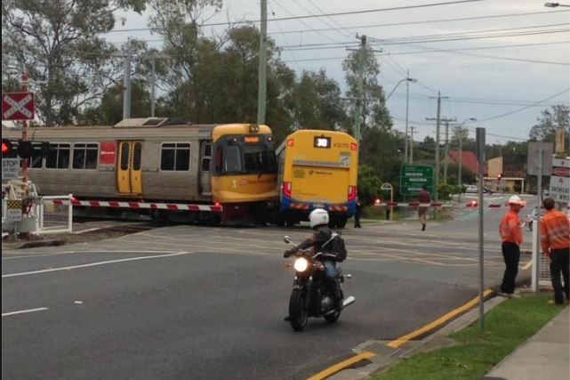 A bus and train have been involved in a low-impact collision