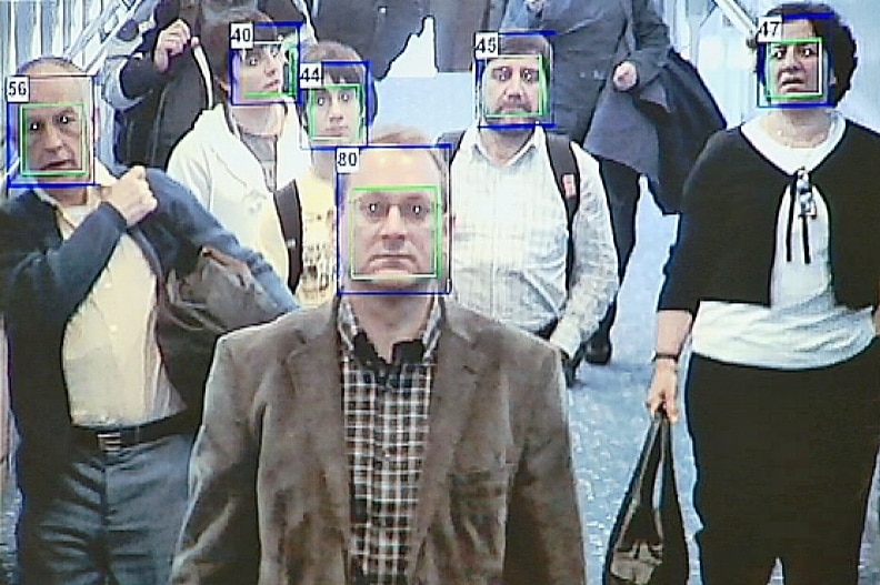 Facial recognition technology used as airline passengers arrive at a terminal.