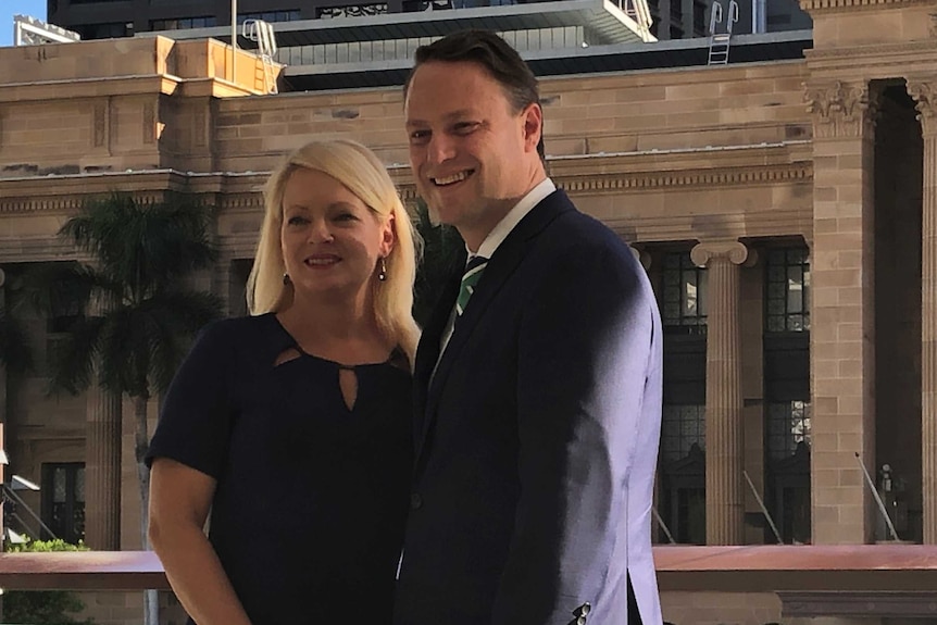 Adrian Schrinner and Krista Adams pose for a photo in Brisbane's King George Square