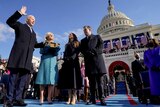 Joe Biden, Jill Biden, Ashley Biden and Hunter Biden stand outside the US Capitol building on a bright, sunny day