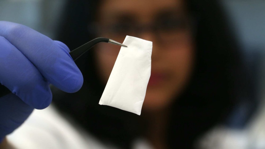 A doctor holds a "bioconstruct" that anchors stem cells to the vaginal wall.