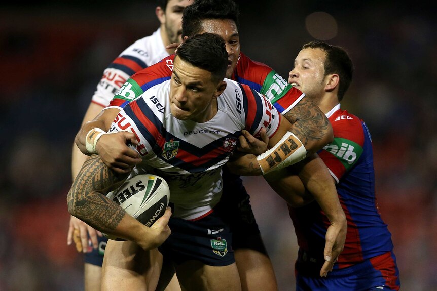 Williams looks to offload for the Roosters