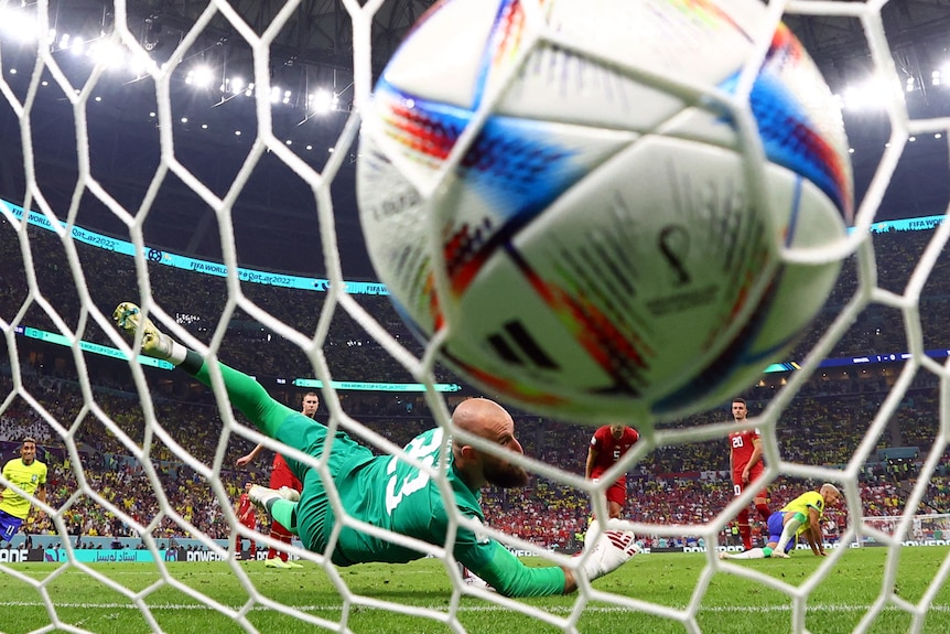 The ball hits the net, seen from behind the goal, after Richarlison's strike against Serbia at the Qatar World Cup.