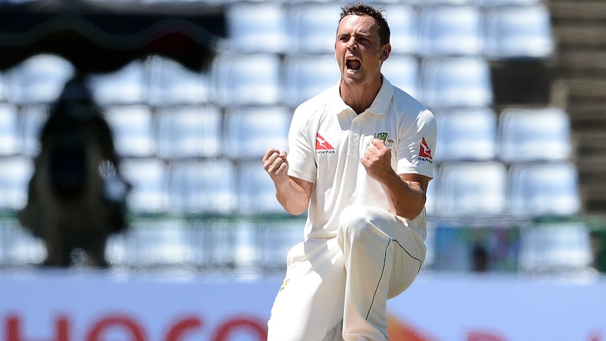 Australia's Steven O'Keefe celebrates Sri Lanka's Kaushal Silva's wicket in the first Test.