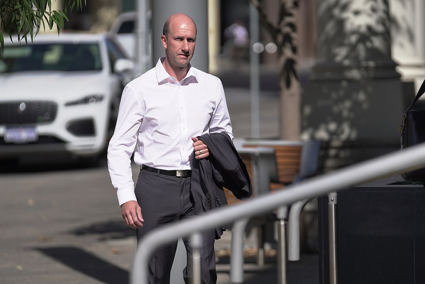 Karate instructor Gavin Smith enters Perth District Court