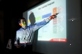 Lion Air's Angkasa Training Center's Captain Dibyo Soesilo gestures as he explains the general training curriculum.