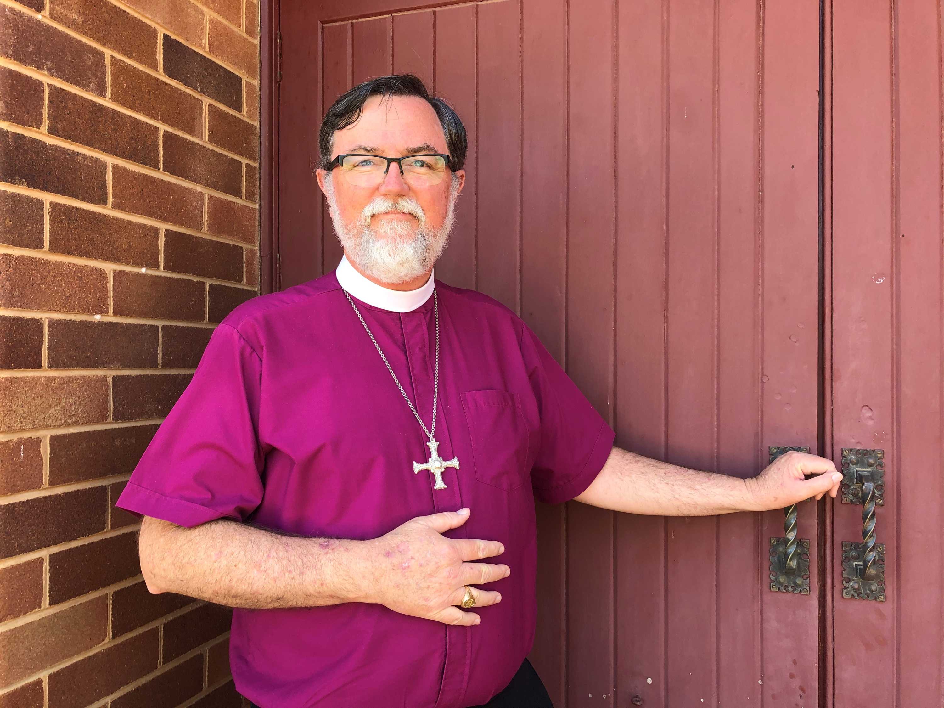 Riverina Bishop Donald Kirk standing outside the Anglican Cathedral in Griffith.