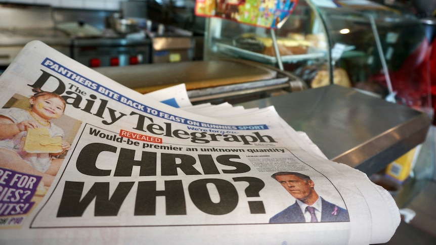 Daily Telegraph newspaper with headline "Chris Who?"