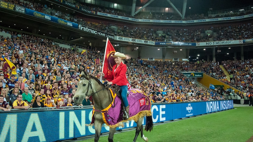 Natalie Siiankoski and Buck ride up and down the sideline at home games in Brisbane.