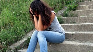 Girl depressed on steps