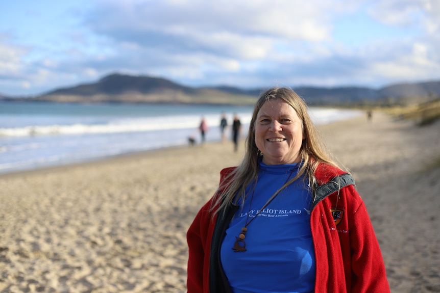 Ingrid smiles on the beach