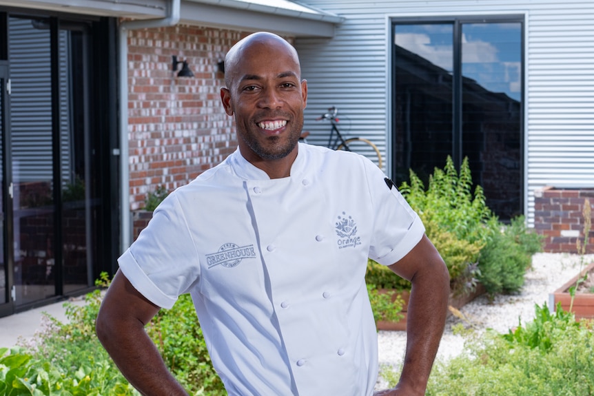 Pastry chef Julio Cesar at work in his chef's uniform