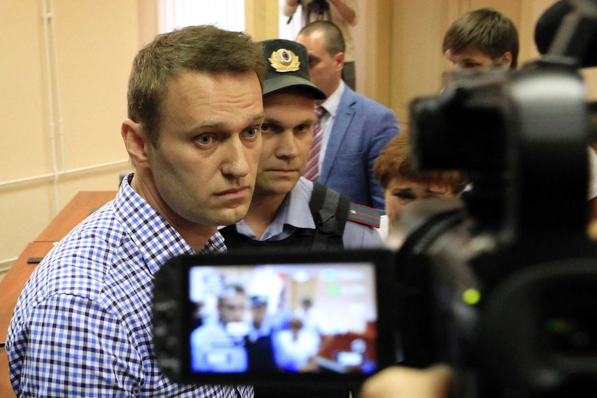 Alexei Navalny appears in court in Kirov, where he was sentenced to five years in prison.