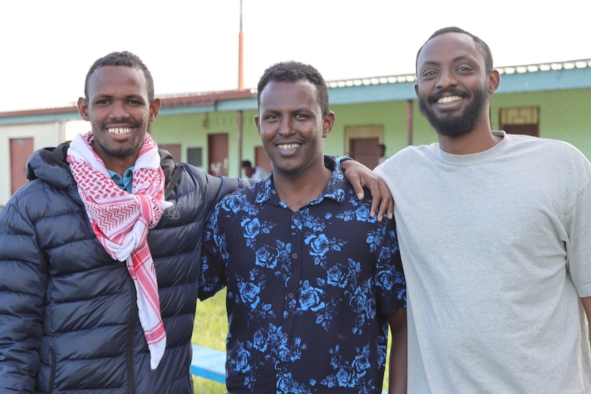 Roble Ibrahim, Faysel Ahmed Selat (President), and Abdimalik Aden, of the Somali Community Association of Queensland. 