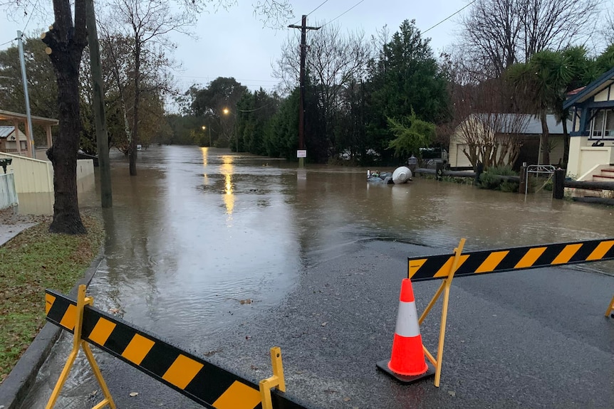 a road cut off by flooding