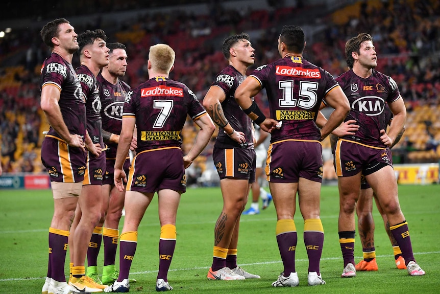 Brisbane Broncos NRL players look disappointed during their loss to the North Queensland Cowboys.
