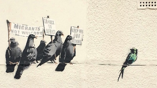 Banksy migrant mural