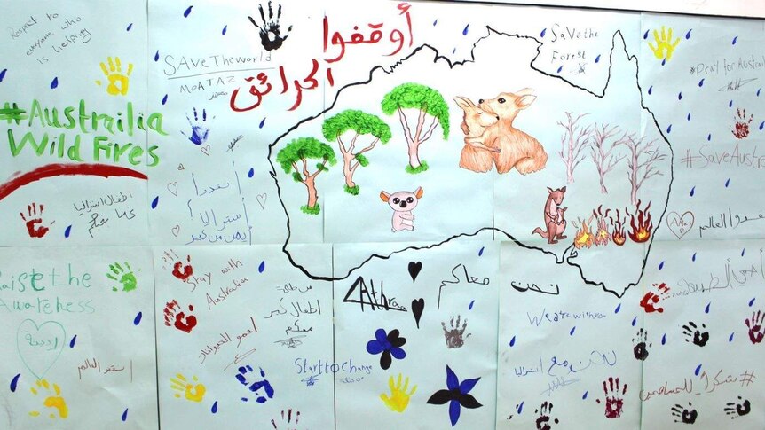 Group drawing by Syrian refugee children of kangaroos, messages in Arabic and English.