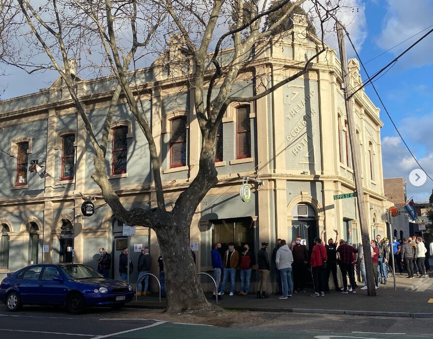 Outside a historic looking pub in Melbourne.