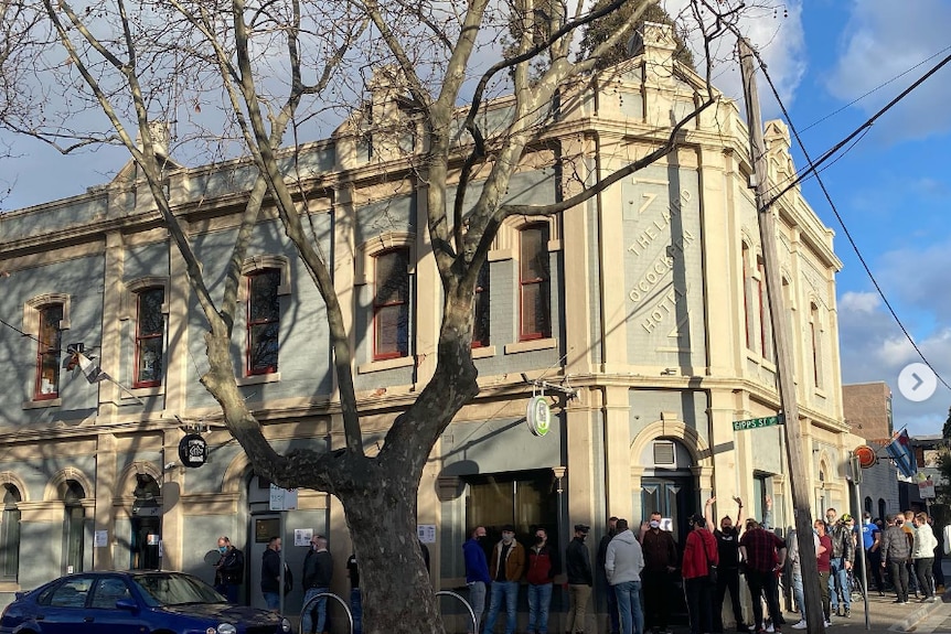 Outside a historic looking pub in Melbourne.