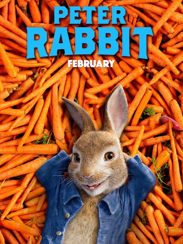 Promotional poster for movie shows rabbit laying on carrots with the word "Peter Rabbit" above.