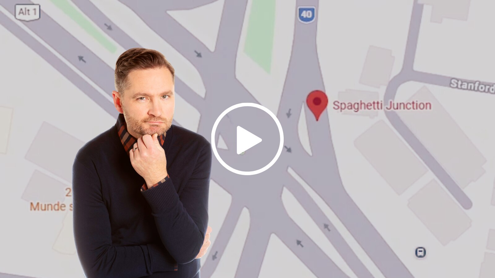 a man in black against a google map background