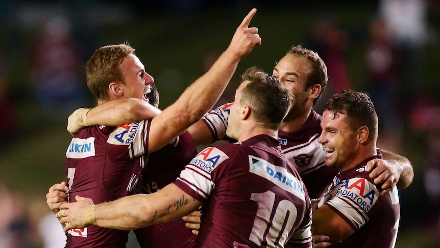 Clutch play ... Daly Cherry-Evans celebrates his winning field goal with his team-mates