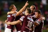 Clutch play ... Daly Cherry-Evans celebrates his winning field goal with his team-mates