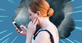 Distressed woman looking at her phone with a dark storm cloud looming around her to depict how traumatic news impacts people.