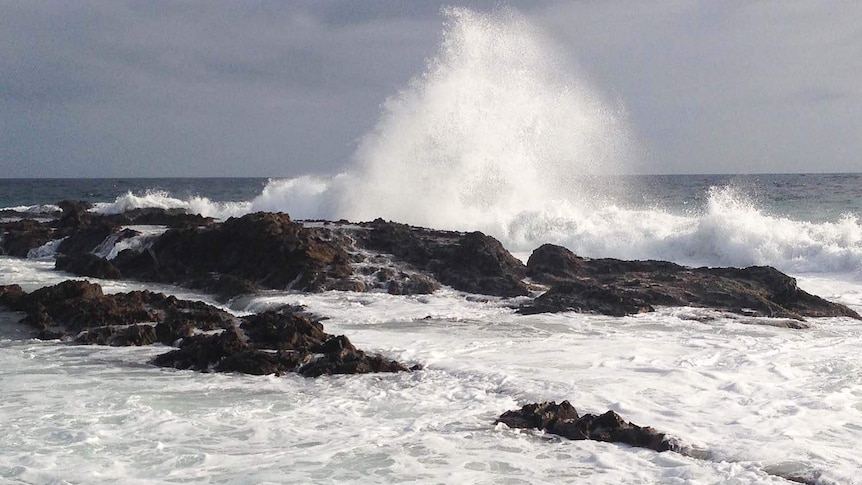 Waves crashing over Snapper Rocks on Queensland's southern Gold Coast.