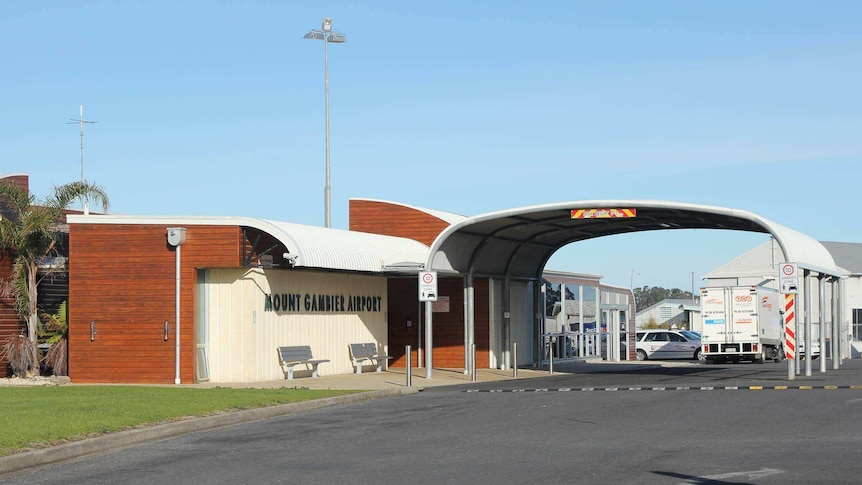 A brick building with the sign "Mount Gambier Airport".