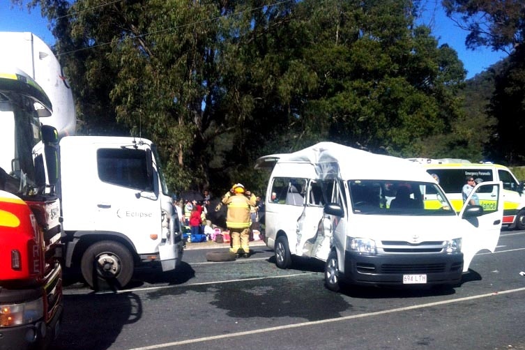Three people have been seriously injured after a truck and mini van collided in the Gold Coast hinterland.