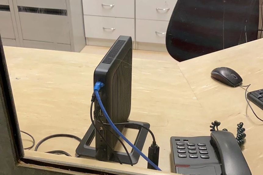 A modem is seen on a desk in an office at the Christmas Island detention centre, where Wuhan evacuees are being quarantined.