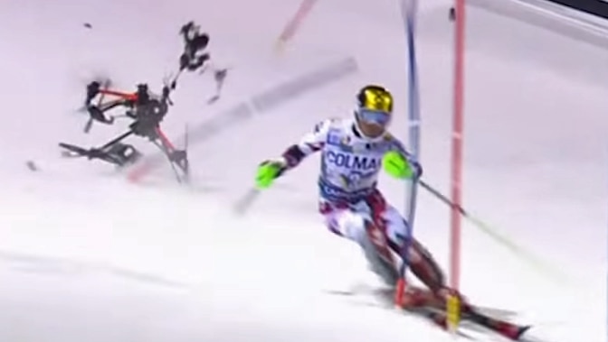 The drone crashed to the ground just centimetres from Hirscher.