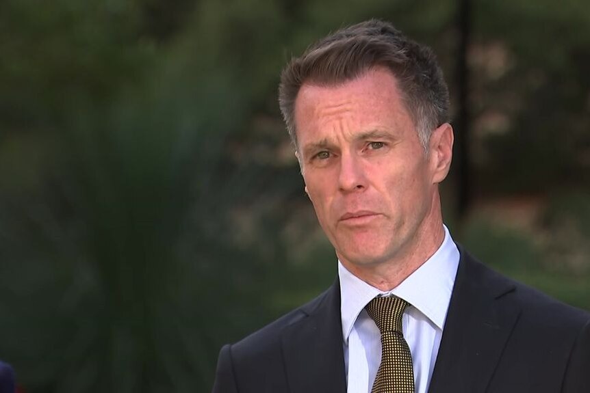 Screengrab of NSW premier Chris Minns with a neutral expression. 