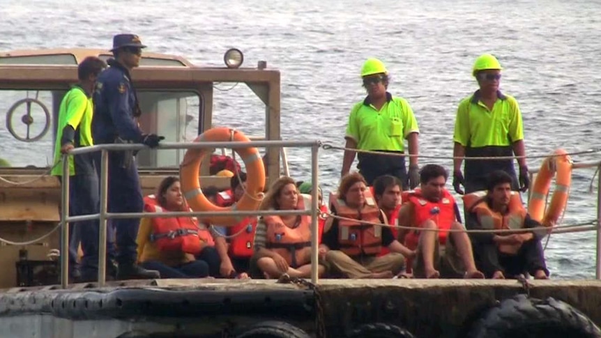Asylum seekers coming ashore 13/07/2013