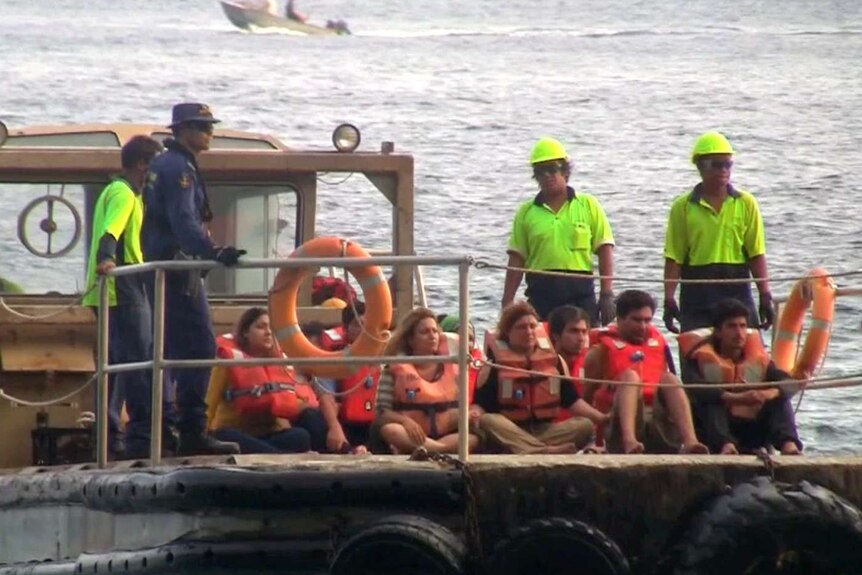 Asylum seekers coming ashore 13/07/2013