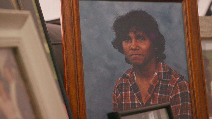 A framed photograph of Aboriginal boy Mark Haines.