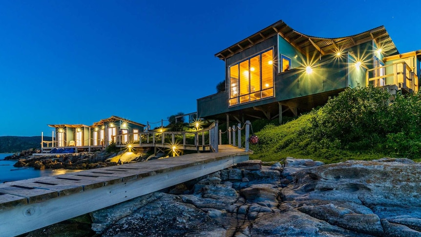 Buildings lit up on island resort.