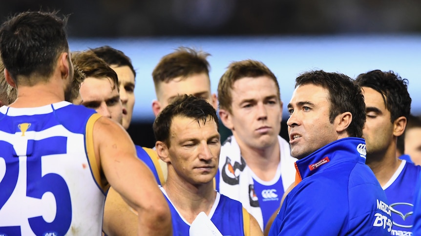 Brad Scott talks to his players