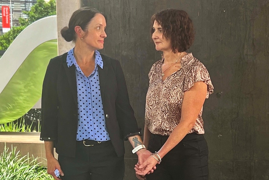 Susan Forte and Senior Constable Catherine Nielson outside after inquest into Senior Constable Brett Forte's death