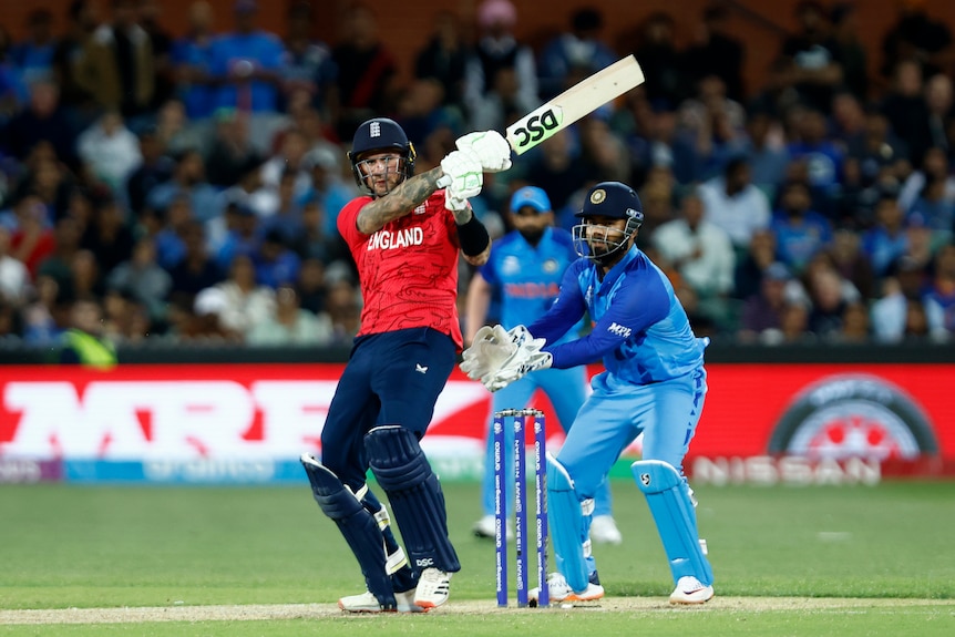 Alex Hales completes a shot to the leg side while Rishabh Pant watches on