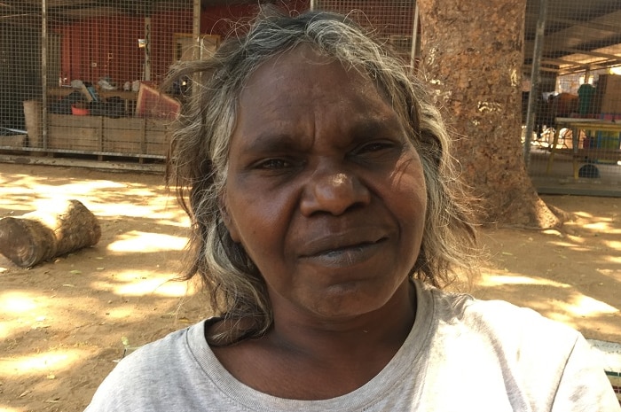 Naomi Wilfred stands outside