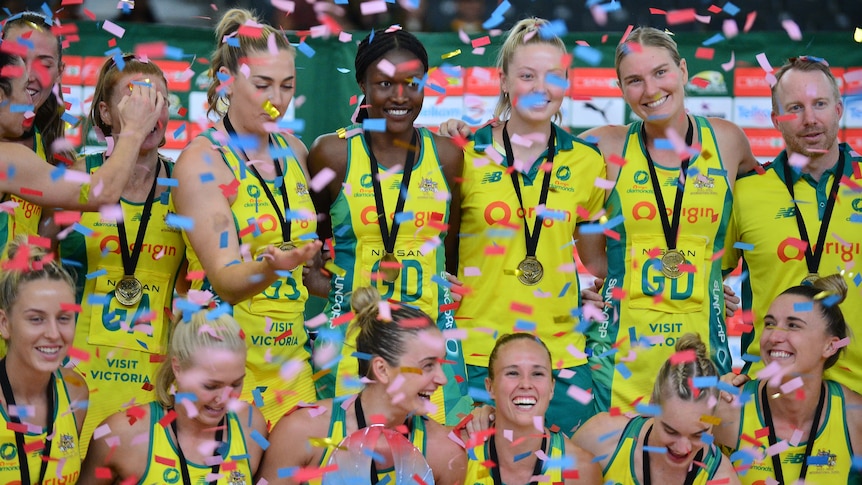 Confetti falls around players from Australia's Diamonds netball team after they won the Quad Series final against New Zealand.