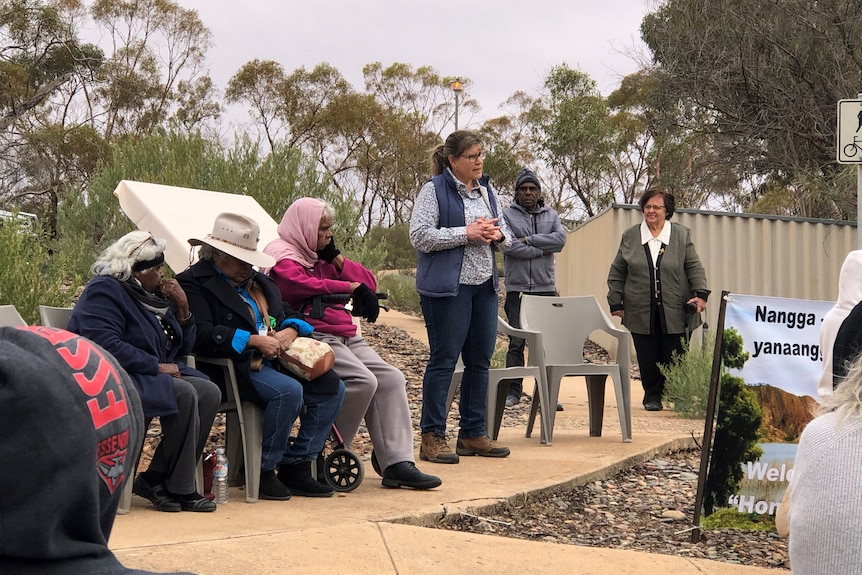 A group of people sitting or standing.