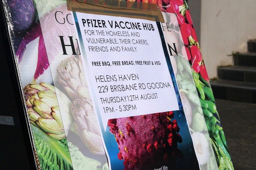 Sign advertising free vaccines and food for vulnerable people