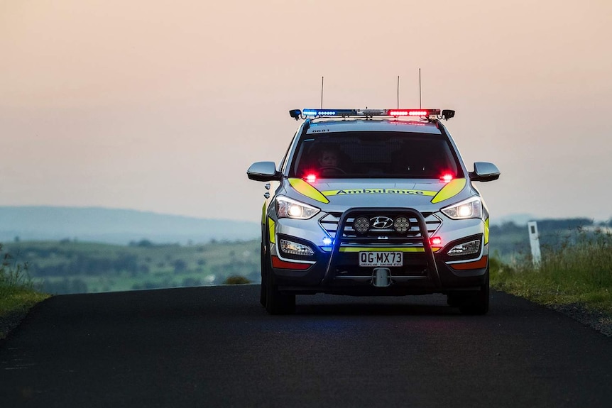 Queensland Ambulance Service emergency response vehicle, responding to a call in a rural area.