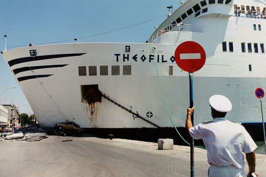 A ship which has crashed into a pier.